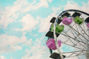 pink and green ferris wheel